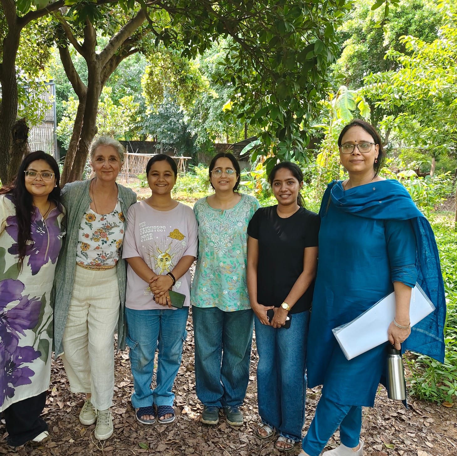 The research team from the School of Environmental Sciences, JNU, at Farm8